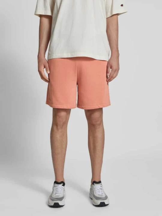 Zdjęcie produktu Szorty z dzianiny dresowej o kroju relaxed fit z naszywką z logo model ‘Sustainable’ Champion Morelowy
