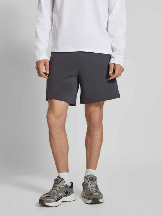 Zdjęcie produktu Szorty z dzianiny dresowej o kroju relaxed fit z naszywką z logo model ‘Sustainable’ Champion Antracytowy