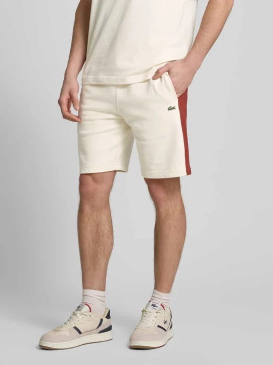 Zdjęcie produktu Szorty z dzianiny dresowej z detalem z logo Lacoste Złamany biały