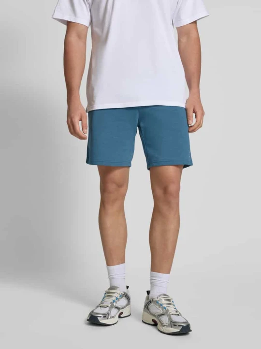 Zdjęcie produktu Szorty z dzianiny dresowej z detalem z logo model ‘GORDON’ Jack&Jones Oceaniczny