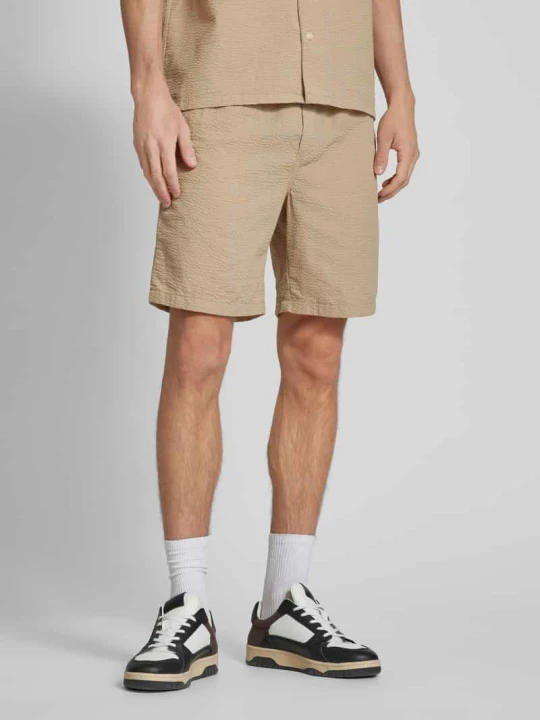 Zdjęcie produktu Szorty z dzianiny dresowej z tunelem model ‘JAIDEN’ Jack&Jones Beżowy