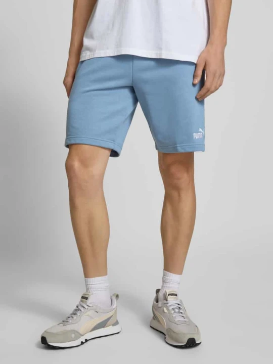 Zdjęcie produktu Szorty z dzianiny dresowej z wyhaftowanym logo Puma Jasnoniebieski