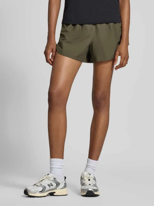 Zdjęcie produktu Szorty z elastycznym pasem model 'NAGINO' Asics Oliwkowy