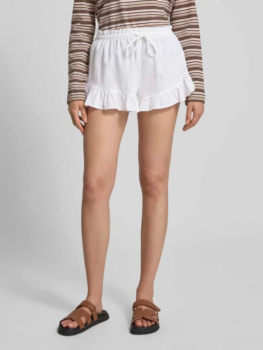 Zdjęcie produktu Szorty z mieszanki lnu z falbanami na dole Gina Tricot Biały
