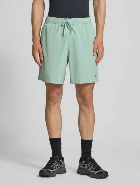 Zdjęcie produktu Szorty z nadrukiem z logo i wpuszczanymi kieszeniami Nike Miętowy
