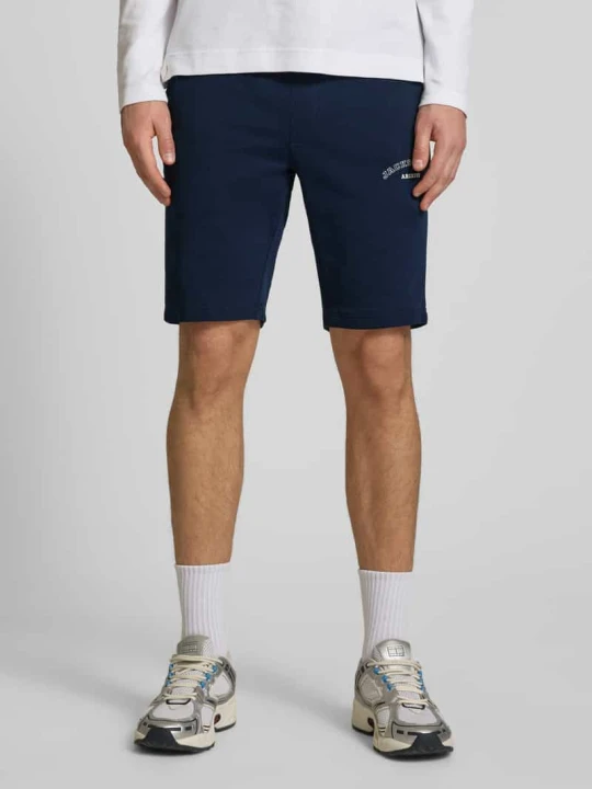 Zdjęcie produktu Szorty dresowe z nadruk z logo model 'GORDON' Jack&Jones Granatowy