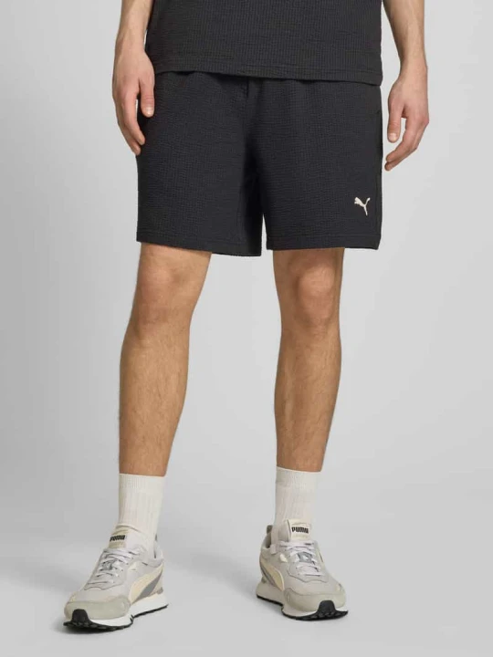 Zdjęcie produktu Szorty z przeszyciem z logo Puma Czarny