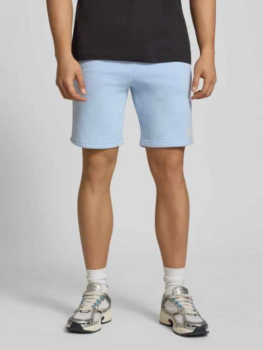 Zdjęcie produktu Szorty z wpuszczanymi kieszeniami i nadrukiem z logo Alpha Industries Jasnoniebieski