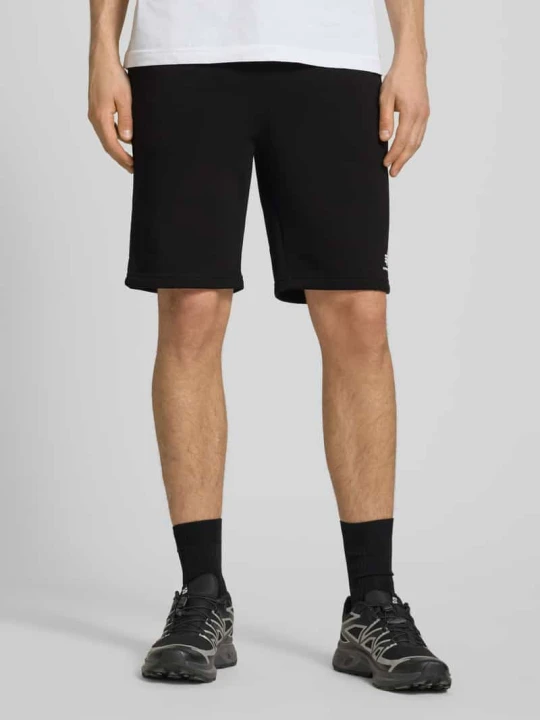 Zdjęcie produktu Szorty z wpuszczanymi kieszeniami i nadrukiem z logo Alpha Industries Czarny