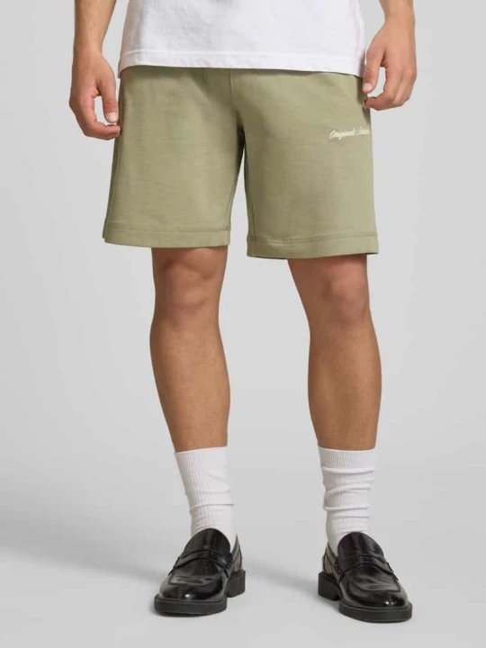 Zdjęcie produktu Szorty dresowe z wyhaftowanym logo model „KARL” Jack&Jones Trzcinowy