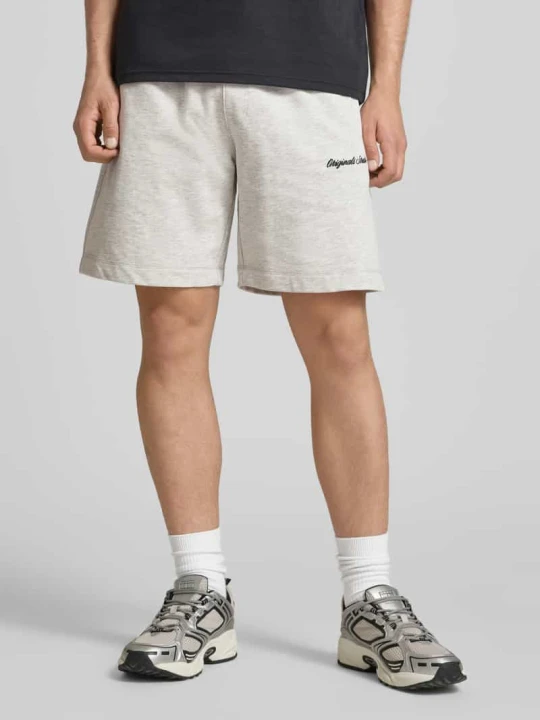 Zdjęcie produktu Szorty dresowe z wyhaftowanym logo model „KARL” Jack&Jones Jasnoszary melanż