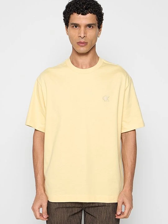 Zdjęcie produktu T-shirt basic Calvin Klein Jeans jasnożółty melanż