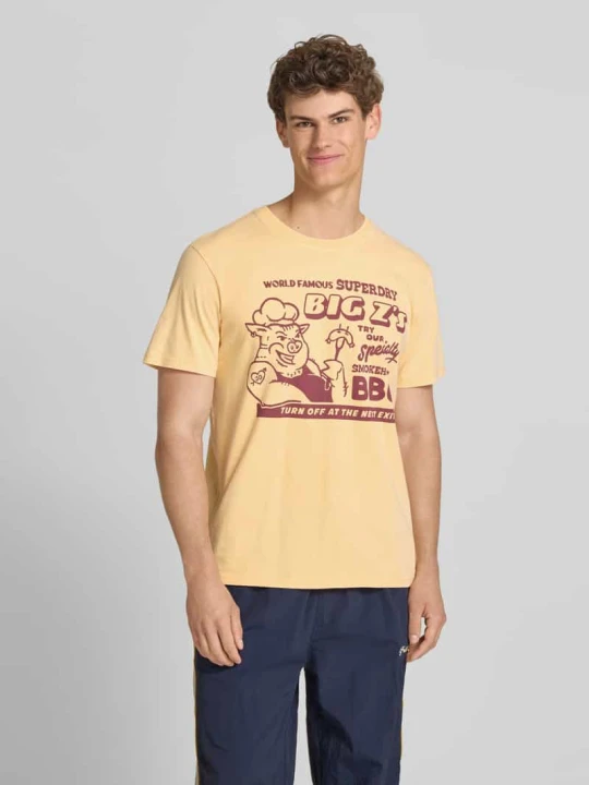 Zdjęcie produktu t-shirt o kroju loose fit z nadrukiem z logo model 'Roadside Trade' Superdry Żółty