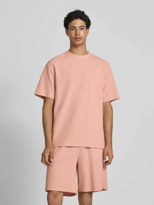 Zdjęcie produktu t-shirt o kroju oversized fit z fakturowanym wzorem Karl Kani Mocnoróżowy