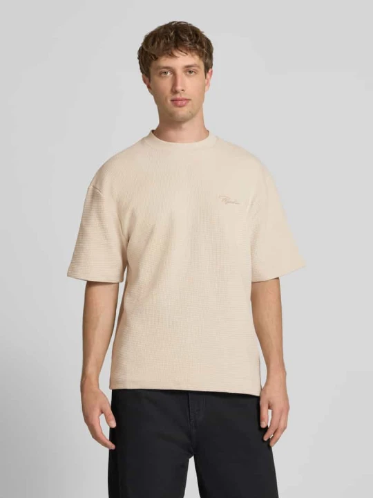 Zdjęcie produktu t-shirt o kroju oversized z fakturowanym wzorem i wyhaftowanym logo Pegador Złamany biały