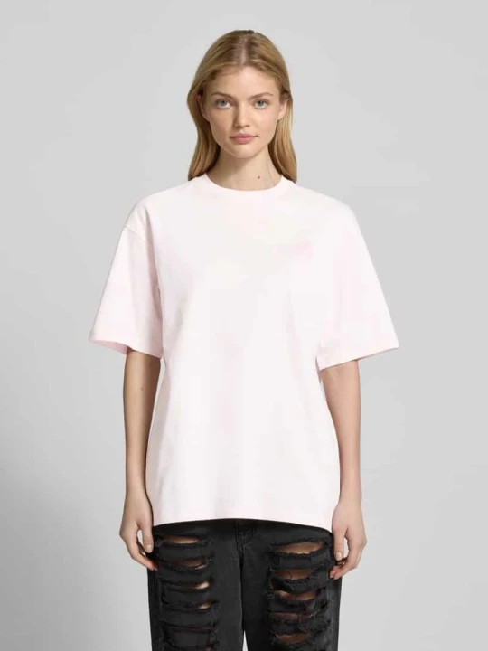 Zdjęcie produktu T-shirt o kroju oversized z nadrukiem z logo REVIEW Różowawy