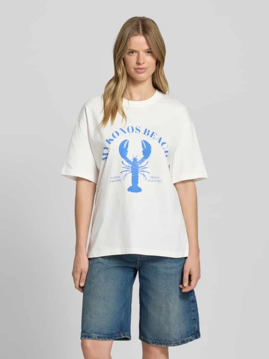 Zdjęcie produktu T-shirt o kroju oversized z nadrukiem z motywem i okrągłym dekoltem Gina Tricot Écru