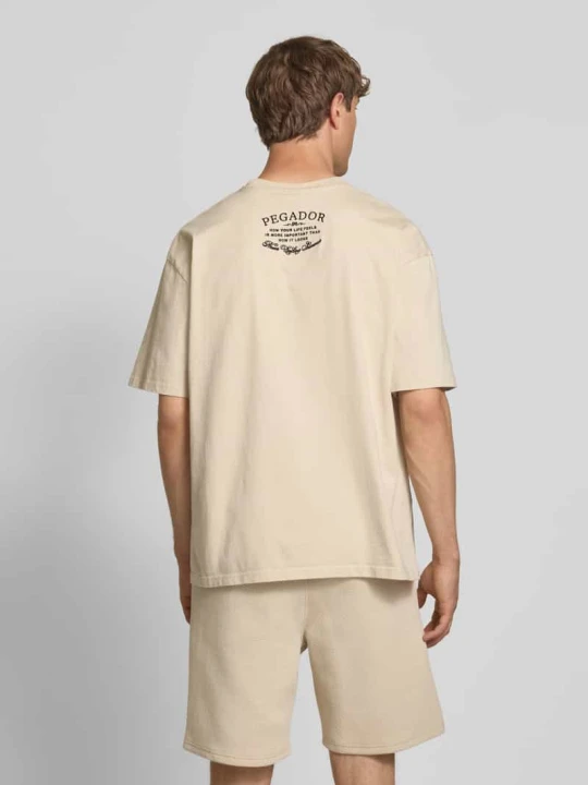 Zdjęcie produktu T-shirt o kroju oversized z wyhaftowanym logo model ‘Hamker’ Pegador Beżowy