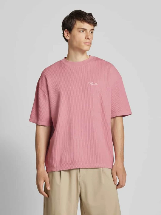 Zdjęcie produktu T-shirt o kroju oversized z wyhaftowanym logo model ‘SIGNAR’ Pegador Brudnoróżowy