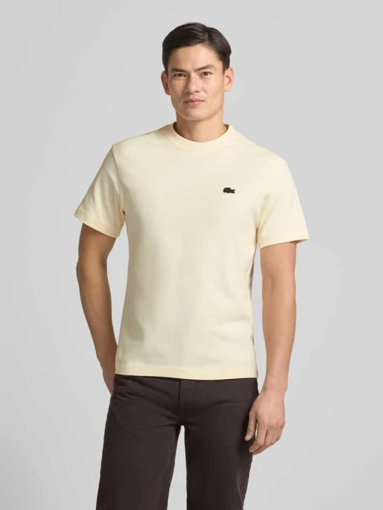 Zdjęcie produktu T-shirt o kroju regular fit z czystej bawełny model „LOURD” Lacoste Écru