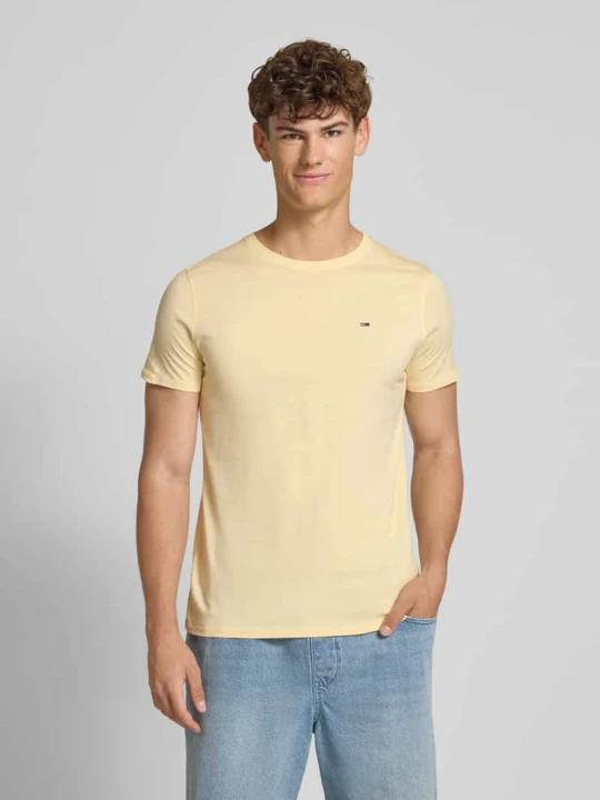 Zdjęcie produktu T-shirt o kroju regular fit z czystej bawełny Tommy Jeans Jasnożółty