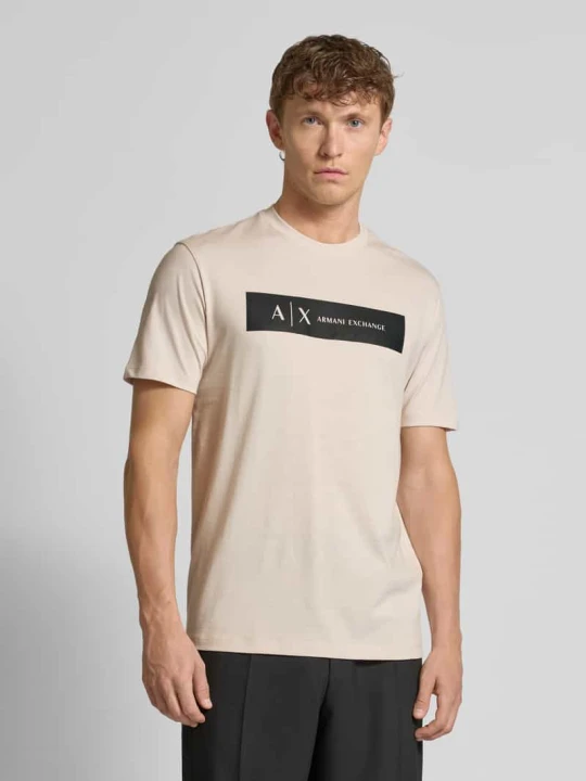 Zdjęcie produktu T-shirt o kroju regular fit z czystej bawełny z nadrukiem z logo Armani Exchange Złamany biały