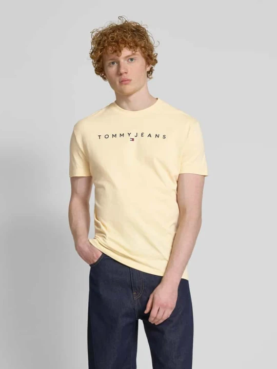 Zdjęcie produktu T-shirt o kroju regular fit z czystej bawełny z wyhaftowanym logo Tommy Jeans Złamany biały