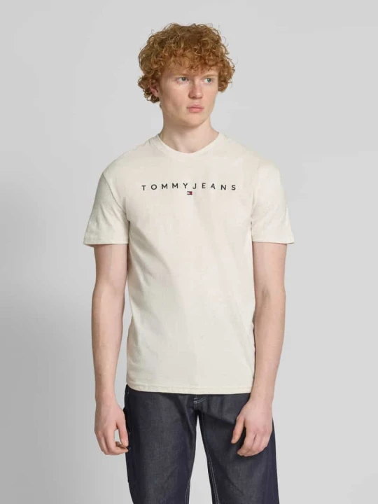 Zdjęcie produktu T-shirt o kroju regular fit z czystej bawełny z wyhaftowanym logo Tommy Jeans Złamany biały melanż