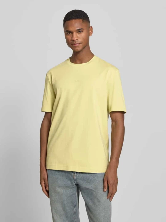 Zdjęcie produktu T-shirt o kroju regular fit z mieszanki bawełny model 'TCHUP' Boss Pastelowy żółty
