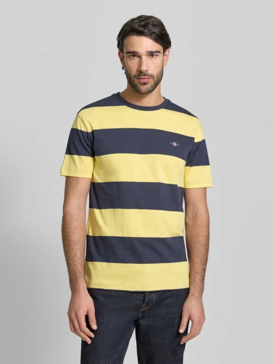 Zdjęcie produktu T-shirt z nadrukiem logo krój regular fit model 'BAR' Gant Jasnożółty