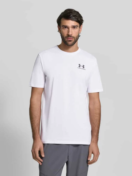 Zdjęcie produktu T-shirt o kroju regular fit z nadrukiem z logo model 'Left' Under Armour Biały