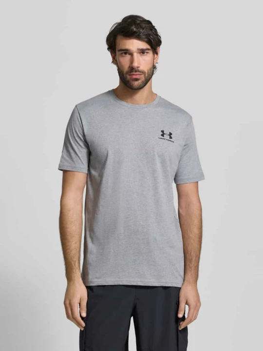 Zdjęcie produktu T-shirt o kroju regular fit z nadrukiem z logo model 'Left' Under Armour Średnioszary
