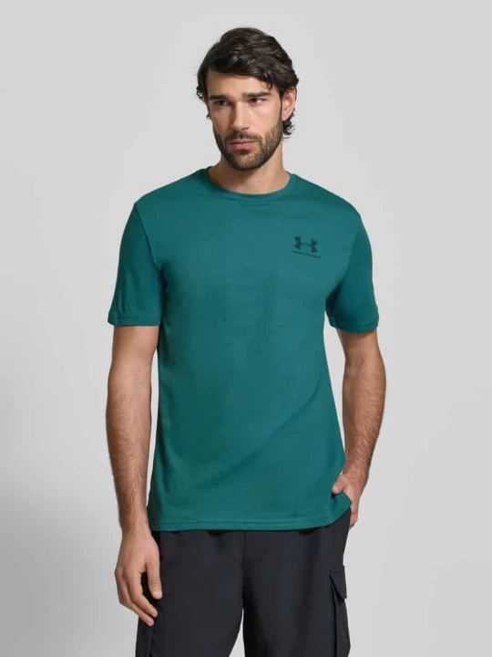Zdjęcie produktu T-shirt o kroju regular fit z nadrukiem z logo model 'Left' Under Armour Petrol