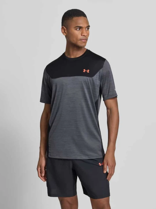 Zdjęcie produktu T-shirt o kroju regular fit z nadrukiem z logo model 'Utility' Under Armour Czarny