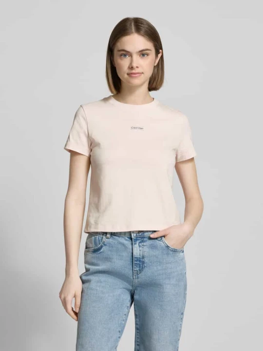 Zdjęcie produktu T-shirt o kroju regular fit z naszywką z logo Calvin Klein Jeans Jasnoróżowy
