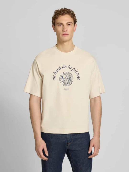 Zdjęcie produktu T-shirt o kroju relaxed fit z czystej bawełny model 'BOXYNORMAN GRAPHIC' Selected Homme Złamany biały