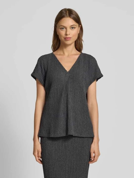 Zdjęcie produktu T-shirt o kroju relaxed fit z dekoltem w serek i ozdobnymi plisami Christian Berg Czarny