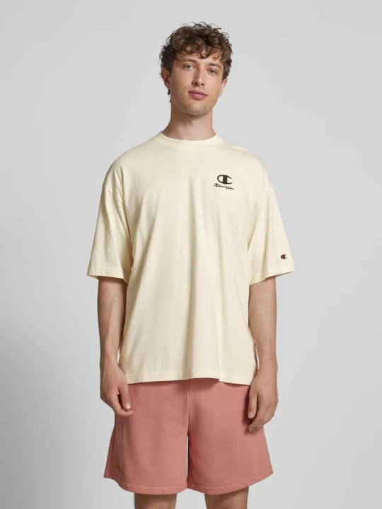 Zdjęcie produktu T-shirt o kroju relaxed fit z wyhaftowanym logo Champion Złamany biały