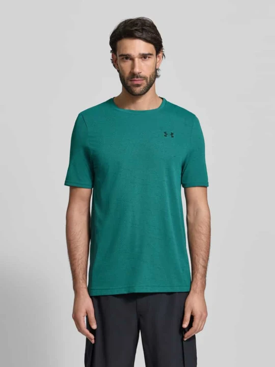 Zdjęcie produktu T-shirt o kroju slim fit z nadrukiem z logo model 'Vanish' Under Armour Petrol