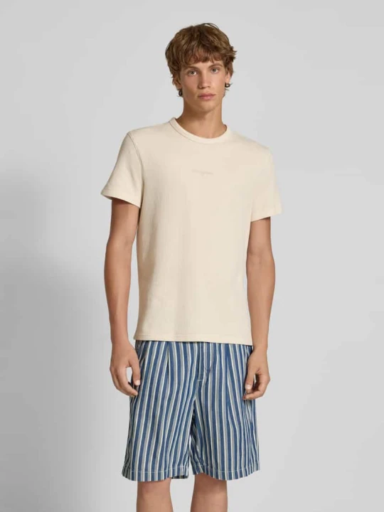 Zdjęcie produktu T-shirt o kroju slim fit ze strukturalnym wzorem Tommy Jeans Piaskowy