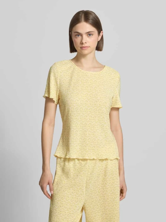 Zdjęcie produktu t-shirt o kroju slim fit ze wzorem na całej powierzchni model 'FLORA' Pieces Jasnożółty