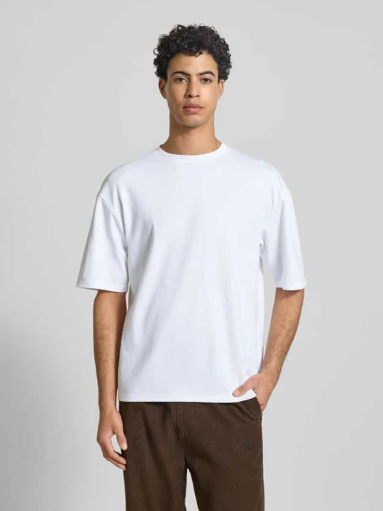 Zdjęcie produktu T-shirt o kroju boxy fit z mieszanki bawełny model 'CASPIAN AIRFLEX BOXY' Only & Sons Biały
