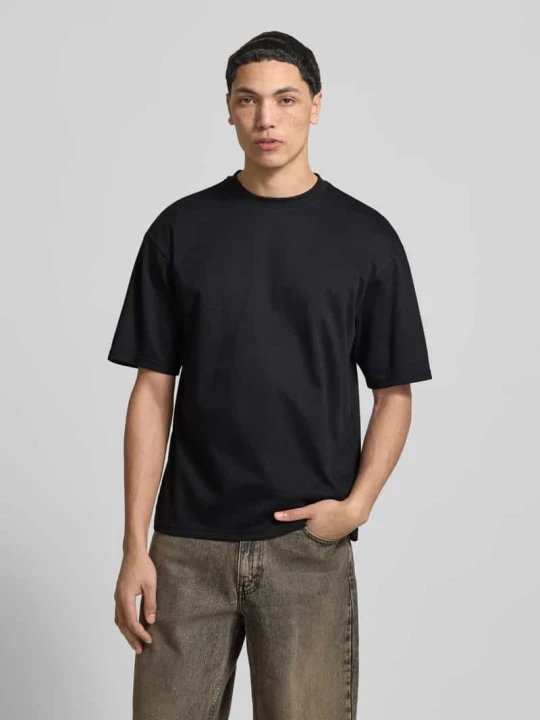 Zdjęcie produktu T-shirt o kroju boxy fit z mieszanki bawełny model 'CASPIAN AIRFLEX BOXY' Only & Sons Czarny