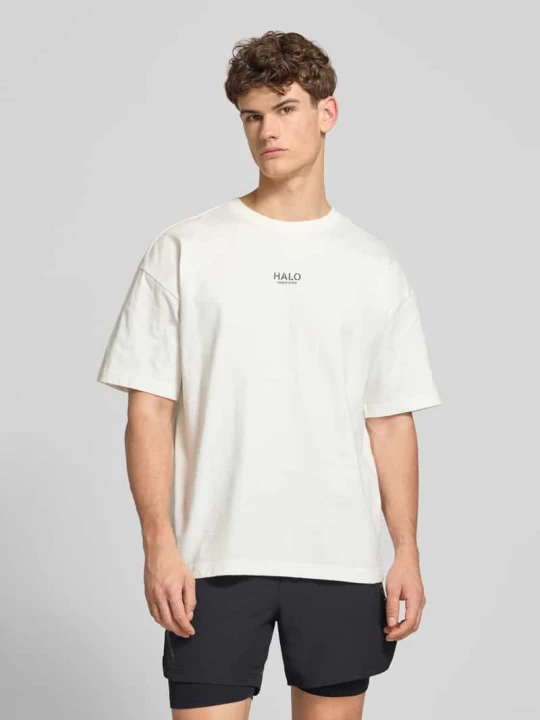 Zdjęcie produktu „T-shirt o pudełkowym kroju z nadrukiem z logo” Halo Złamany biały