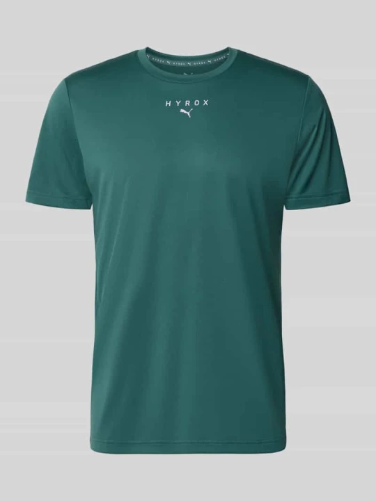 Zdjęcie produktu t-shirt sportowy o kroju regular fit z nadruk z logo model 'M PUMA X HYROX' Ciemnozielony