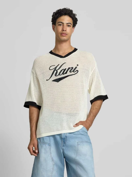 Zdjęcie produktu t-shirt w imitacji wykonania na szydełku z dekoltem w serek Karl Kani Biały