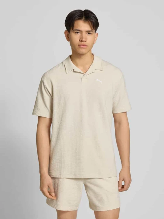 Zdjęcie produktu T-shirt w kroju regular fit z haftowanym logo Puma Złamany biały