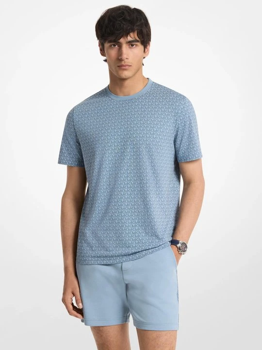 Zdjęcie produktu T-shirt z bawełnianego dżerseju z nadrukiem w charakterystyczne logo Michael Kors CHAMBRAY (Niebieski)