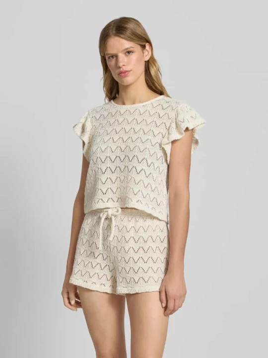 Zdjęcie produktu T-shirt z haftem angielskim model ‘Isadora’ Gina Tricot Złamany biały