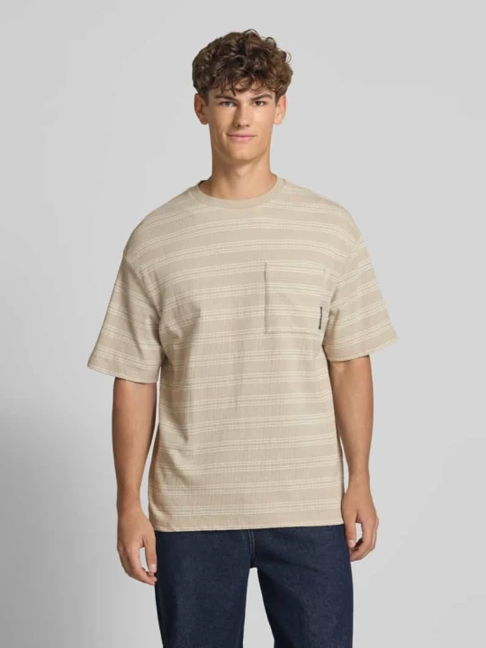 Zdjęcie produktu T-shirt z kieszenią na piersi Calvin Klein Jeans Beżowy